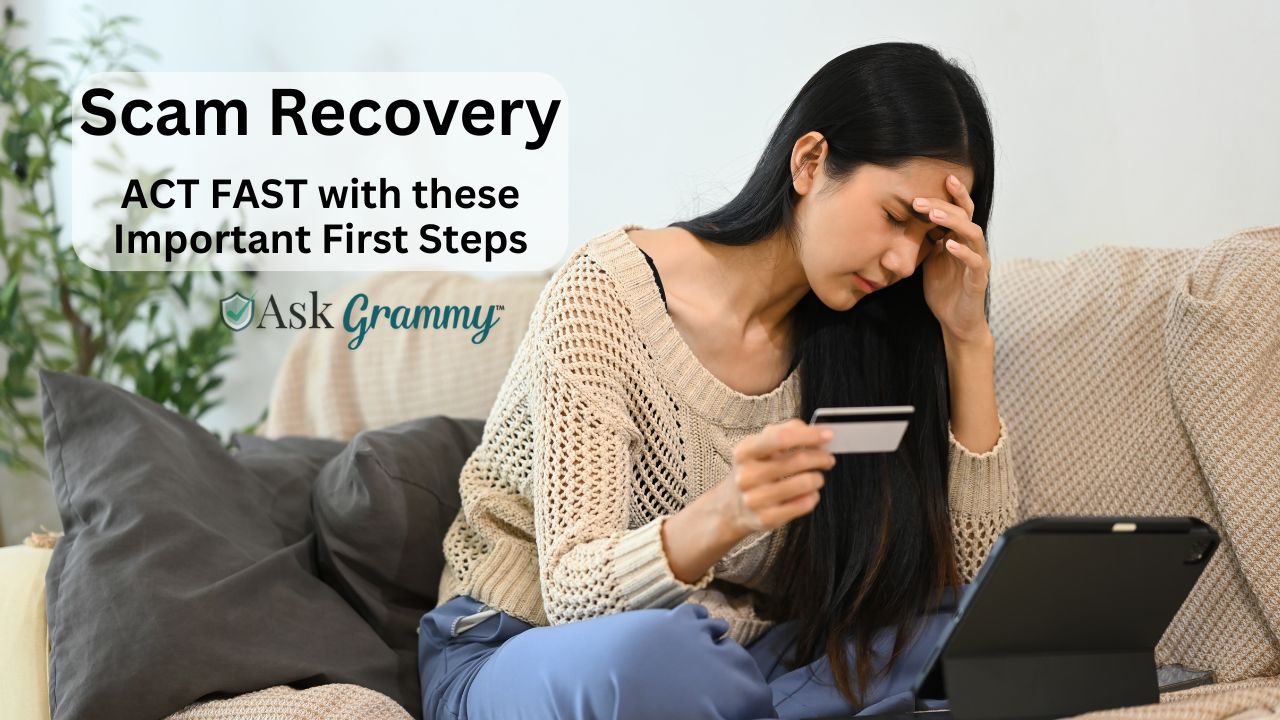 Woman looking worried, holding credit card and looking at her computer screen